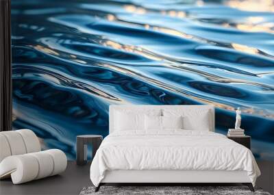 Tranquil blue abstract water texture with light patterns reflecting waves on a serene, clean surface Wall mural