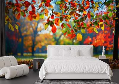 Vibrant autumn leaves dancing on branches in a picturesque park, creating a lively backdrop of seasonal beauty Wall mural