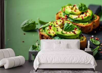 Vibrant avocado and spinach toast against a minimalist green backdrop celebrating fresh and healthy snacking Wall mural