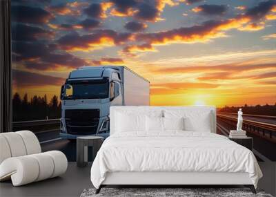 White delivery van cruising along the highway with a stunning sunset backdrop Wall mural