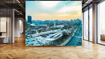 Buildings under blue sky and white clouds Wall mural