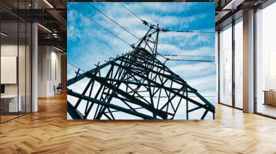 Electricity transmission facilities under the blue sky. Wall mural