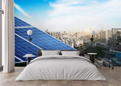 Aerial view of the city and the tower on top of the solar panel Wall mural