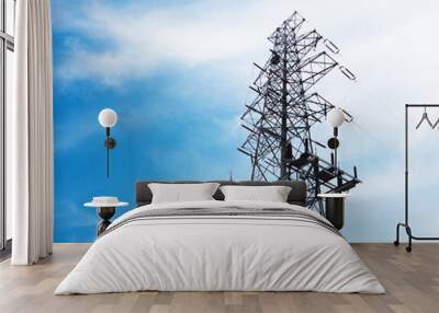 High voltage electric tower in the blue sky white cloud backgrou Wall mural