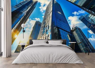 The modern architectural scene of high-rise buildings is particularly bright under the blue sky and sunshine. Wall mural