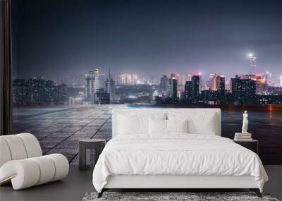 Night view of city lights in front of marble square, Xuzhou, China Wall mural