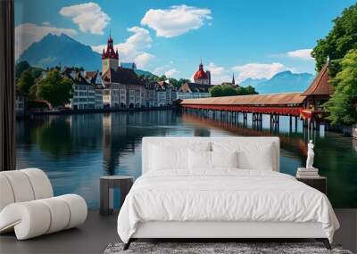 Breathtaking summer panorama of Lucerne featuring Chapel Bridge and Mount Pilatus against a backdrop of clear blue skies Wall mural