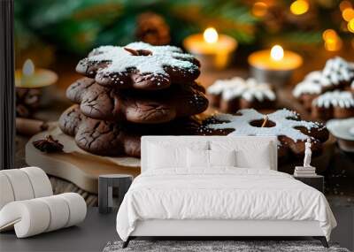 Cozy chocolate gingerbread cookies adorned with white icing, radiating festive cheer and warmth for Christmas and New Year celebrations on a charming wooden table Wall mural