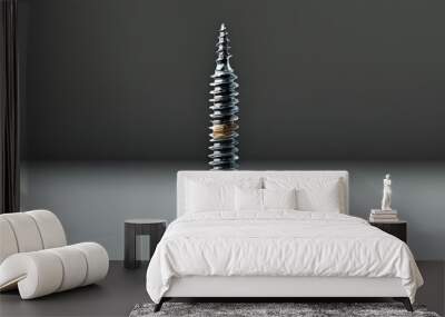 Intricate Details of a Pointed Threaded Metal Object and Nut Wall mural