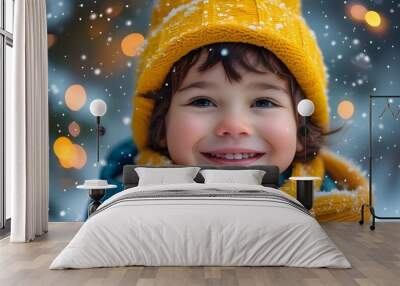 Joyful child in yellow hat and scarf embracing snowfall with a bright smile against a whimsical winter backdrop illuminated by soft, glowing lights Wall mural