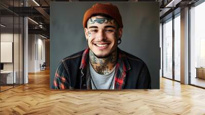 Joyful tattooed youth in relaxed attire Wall mural