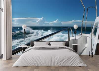 Ocean vista from ships railing with choppy waves, white hull in foreground, under a clear blue sky Wall mural