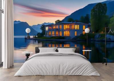 Serene Lakeside Villa at Dusk with Mountain Views and Illuminated Windows Reflecting on Tranquil Waters Wall mural