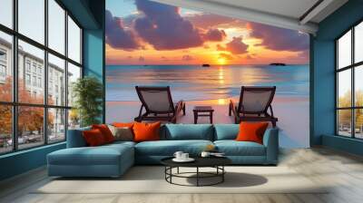 Serene sunset on a white sandy beach with two empty chairs in the Maldives Wall mural