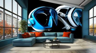 Sleek black and blue diving mask elegantly presented against a dark backdrop Wall mural