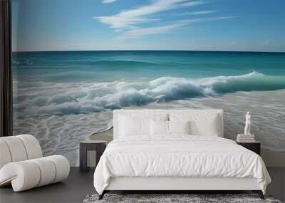 Tranquil seascape of gentle waves on sandy shore under clear blue sky and warm sunlight Wall mural