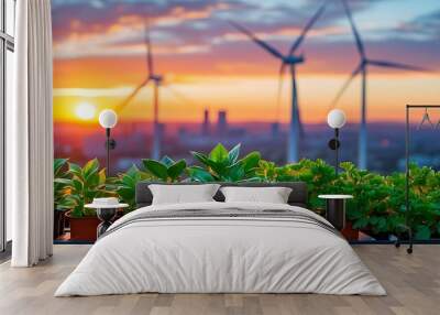 Urban sustainability highlighted by a vibrant green plant in a pot, contrasting against wind turbines and a city skyline at sunset Wall mural