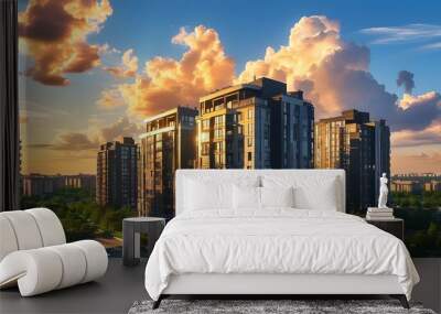 Vibrant urban landscape under bright sun with intriguing shadows and artistic cloud formations in a clear blue sky Wall mural