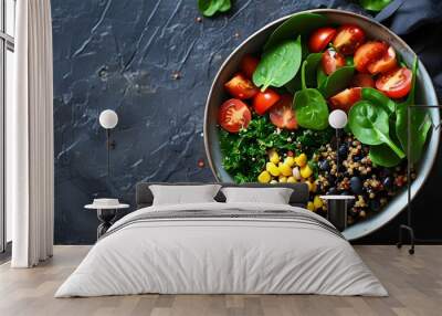 Vibrant vegan quinoa salad bowls featuring spinach, cherry tomatoes, black beans, and corn set against a dark textured backdrop Wall mural