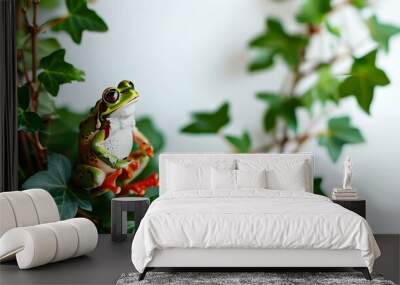 Whimsical Leap Day Celebration with Playful Toy Frogs Amidst Lush Ivy Leaves on a Bright White Canvas Wall mural