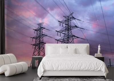 high voltage line transmission tower at sunset Wall mural