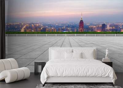 Empty brick floor with city skyline background Wall mural