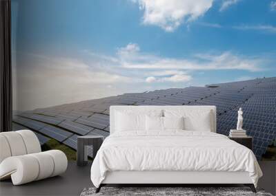 Expansive Solar Panel Field Under Clear Sky Wall mural