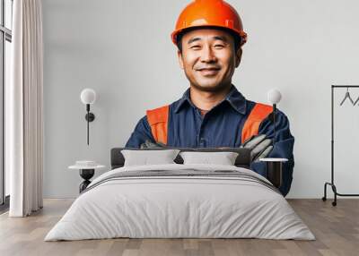 Worker wearing hard hat smiling positively Wall mural