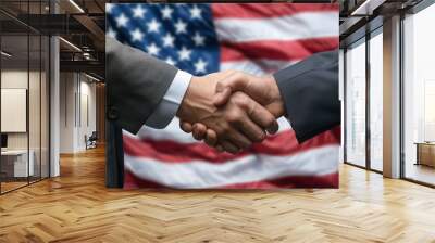 Two men in suits shaking hands against the backdrop of an American flag, in a close-up Wall mural