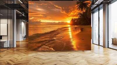 A breathtakingly beautiful sunset seaside scenery. The sky is ablaze with warm hues of orange, pink, and purple as the sun dips below the horizon. The waves gently lap at the shore, creating a soothin Wall mural