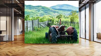 old tractor and mountain range background Wall mural