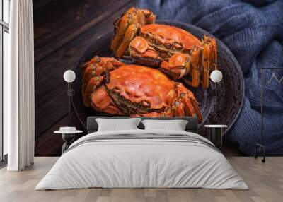 Two cooked hairy crabs on the table. Wall mural