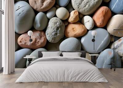 A pile of pebbles and stones of various shapes presents natural textures and colors, giving people a feeling of tranquility and nature. Wall mural