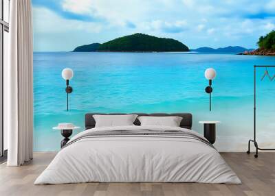 Peaceful island sea view, beautiful beach under a clear blue sky. Wall mural