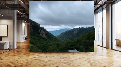 clouds over the mountains Wall mural