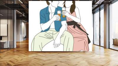 A young couple are drinking beer together Wall mural