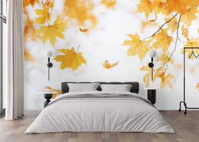 A close-up of yellow maple leaves on the right side, with a blurred white background and sunlight filtering through them. The light is soft and warm, creating an atmosphere full of autumn color Wall mural