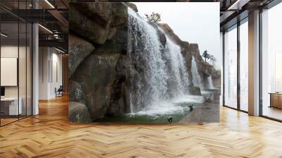 View of the waterfall at the cliff Wall mural