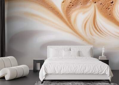 A close-up of the surface of a latte mixed with coffee and milk to be used as a banner. Wall mural