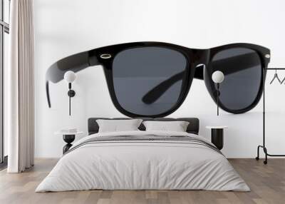 Cool sunglasses with black plastic frame isolated on white background Wall mural