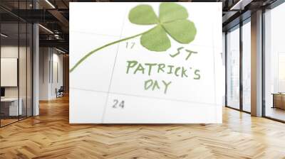 st patricks day on march calendar pin and clover.. Wall mural