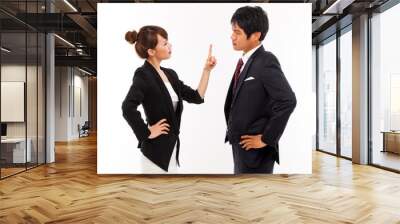 Fight business couple isolated on white background. Wall mural