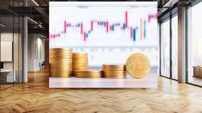 The stock market chart is on the background of golden coins and a digital cryptocurrency coin. Wall mural